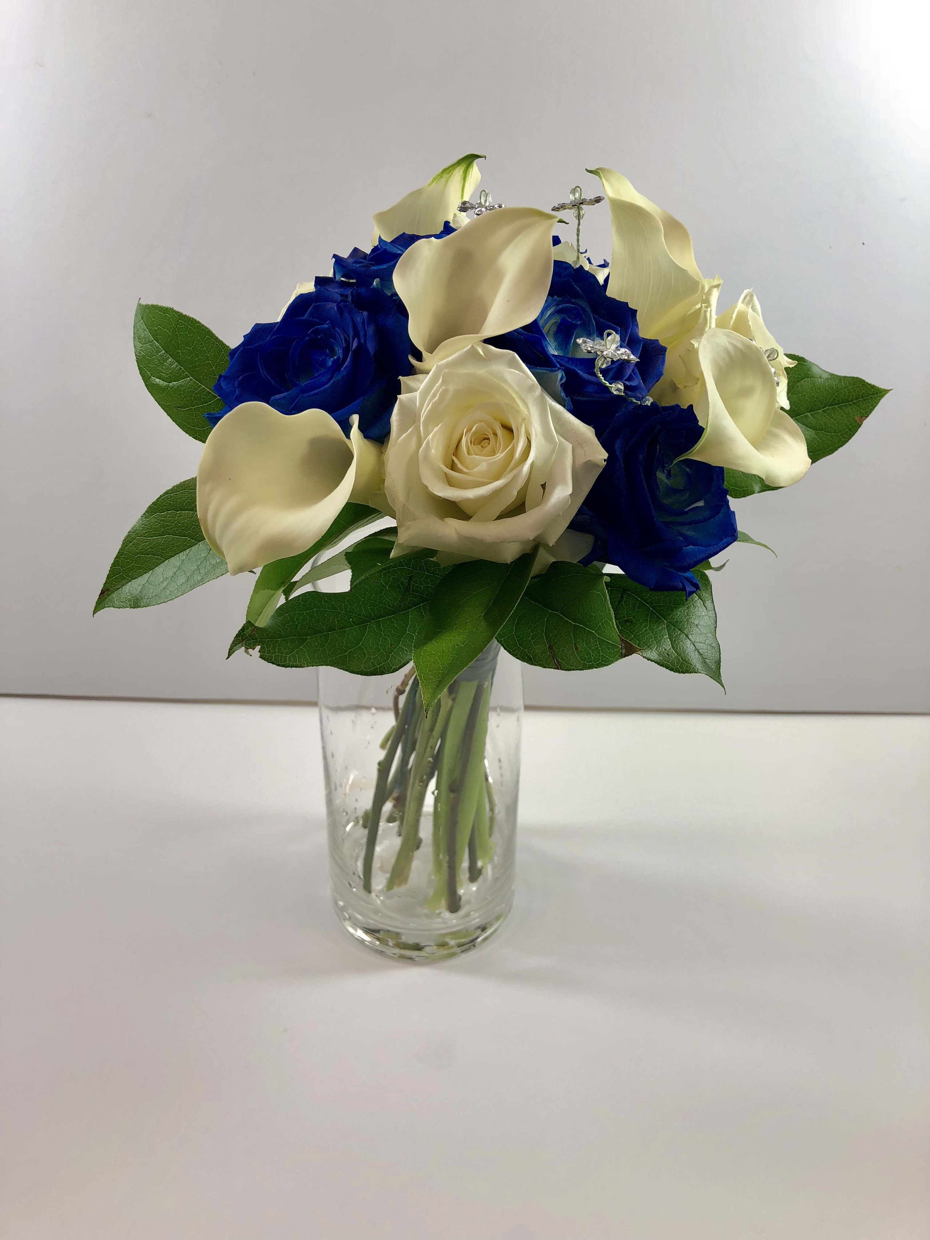 C12 Prom Clutch with Roses and Cala Lilies  - Clutch with Roses and Cala Lilies.  This design has some roses sprayed to match a royal blue dress.    Each design is customized for your date and her beautiful dress.