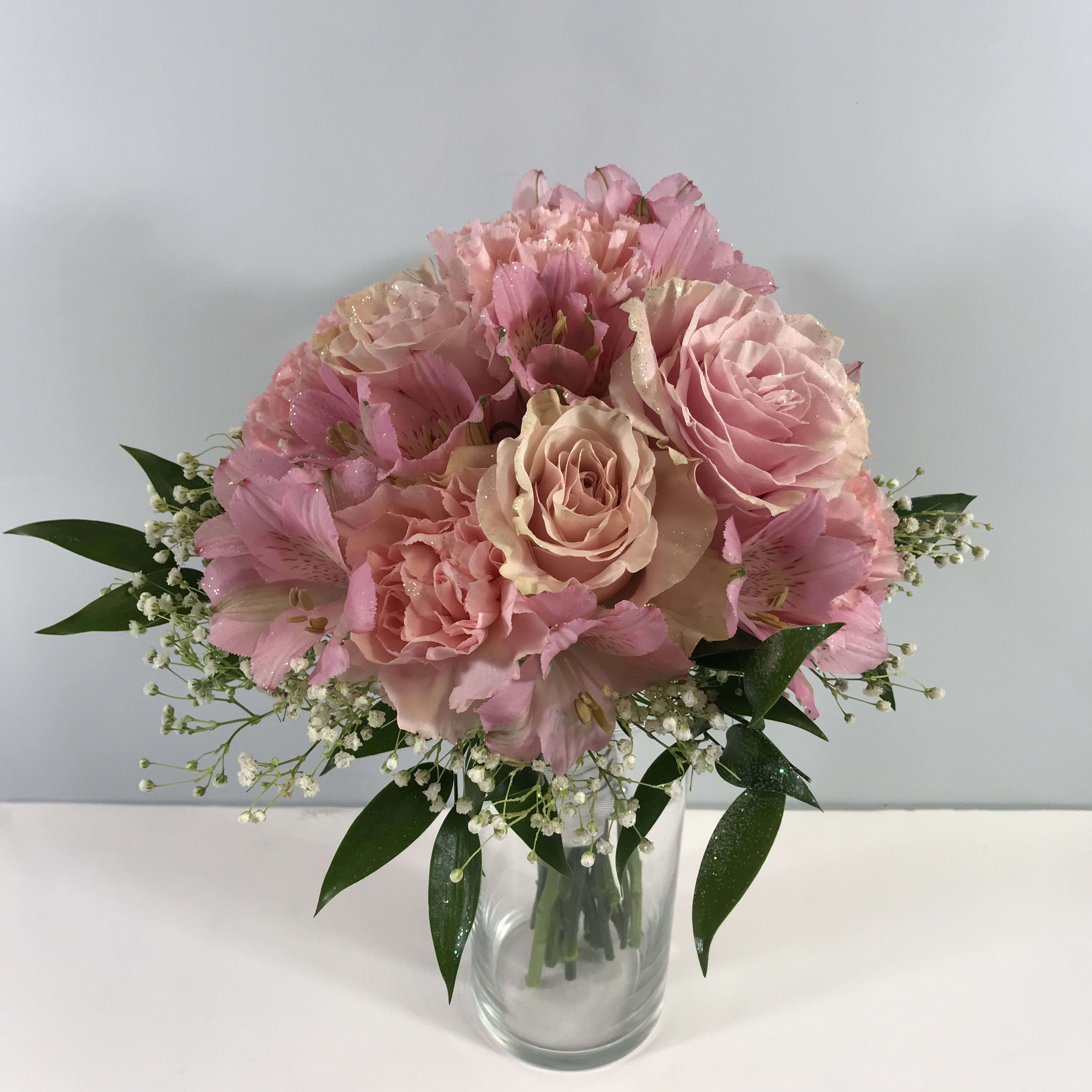 C4P All Pink Prom Clutch - This clutch is a combination of pink roses, pink alstroemeria and pink carnations.  Each prom order is customized for you and your date's lovely gown.