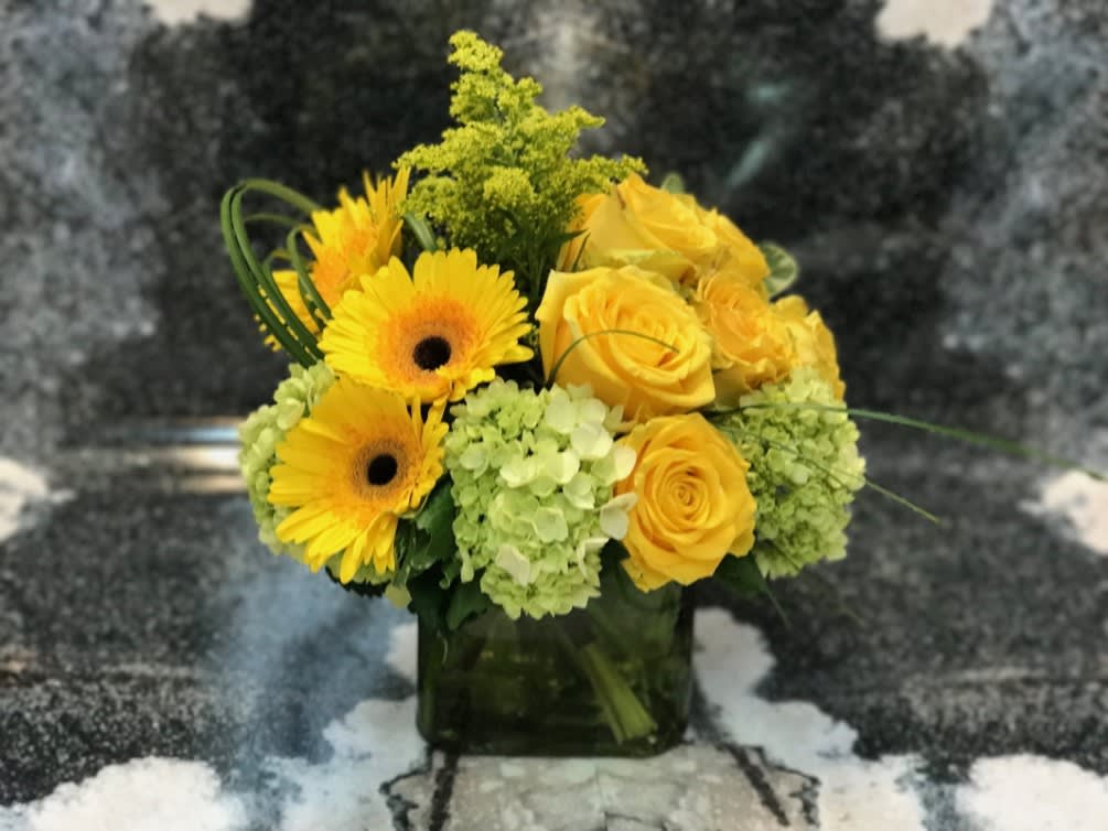 My Sunshine - A Cheerful Friendship arrangement designed with Yellow Gerbera, Green Hydrangea, Yellow Roses, and Solidago Aster