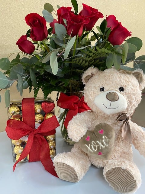 Beautiful flowers with teddy bear online