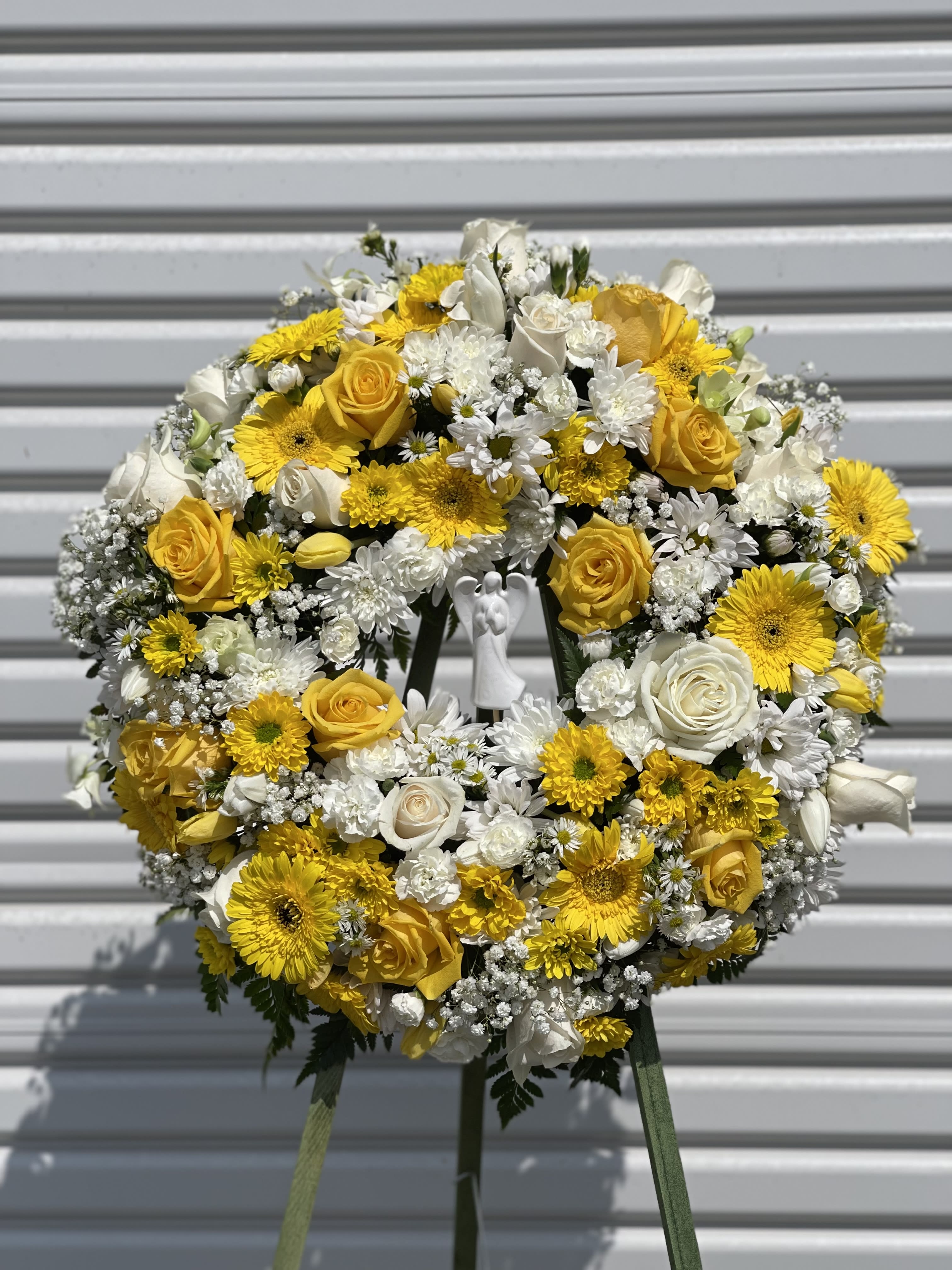 Small yellow and white wreath w/ angel  - Approximately 18”