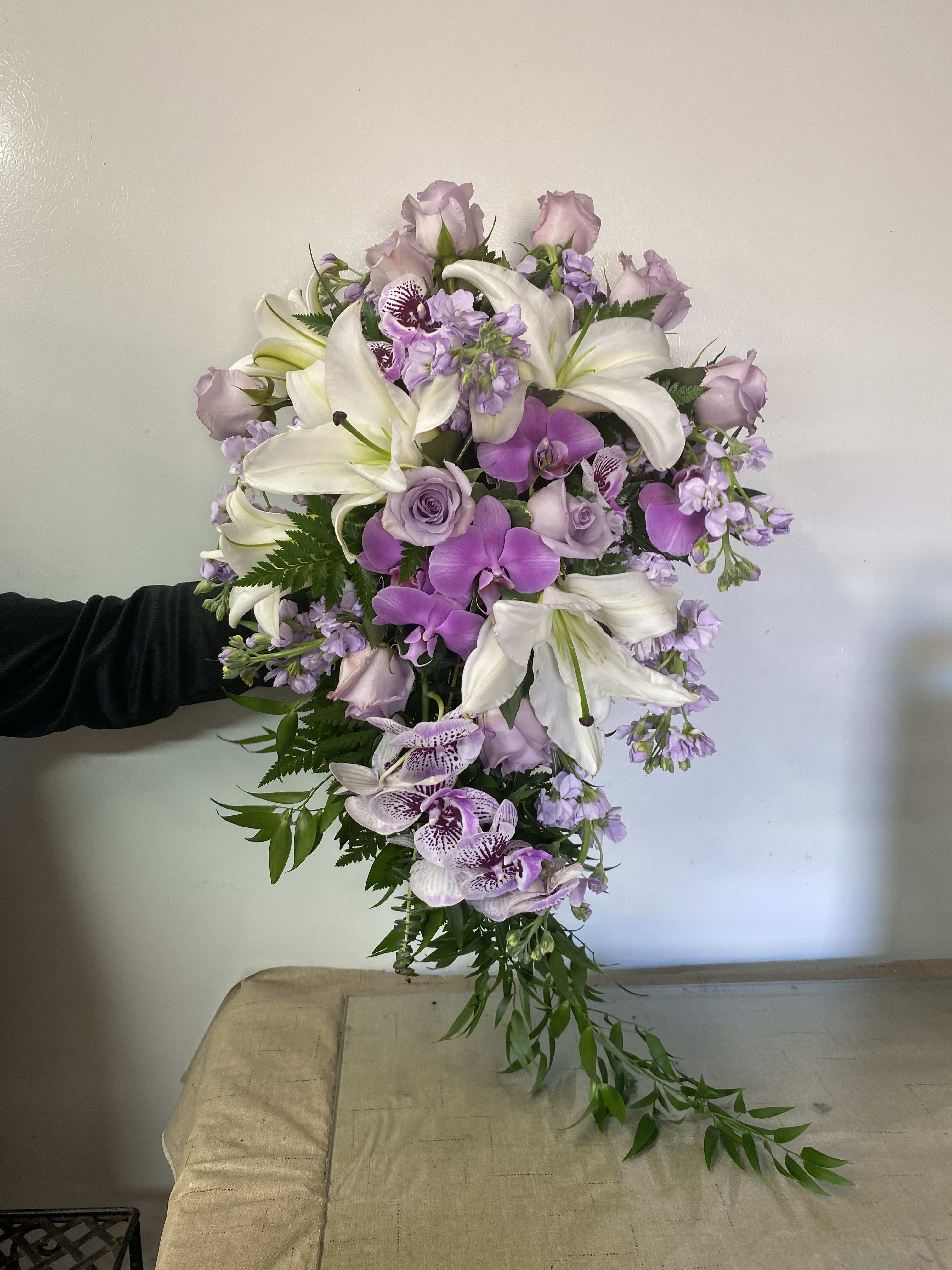 bridal bouquet with white lilies and roses
