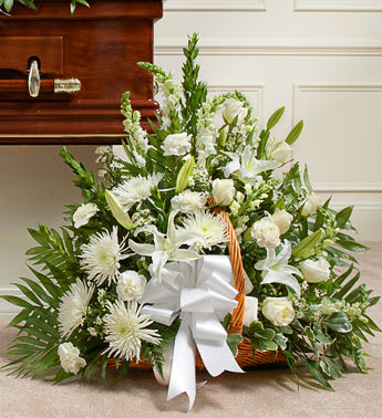 Thoughts and Prayers Fireside Basket - White - Product ID: 91204   Send a message of sympathy, love and hope with this basket of white flowers. Our florists create this special sympathy arrangement in a fireside basket filled with roses, lilies, spider mums, snapdragons and more Accented with crisp greenery Usually sent by family members, friends or business associates Delivered directly to the funeral home Due to the urgency of the occasion, our florists use only the freshest flowers available so varieties and colors may vary Measures approximately 28âH x 28âL