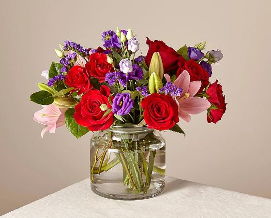 Truly Stunning Bouquet Truly Stunning Bouquet - This dreamy jewel toned bouquet combines bold color and eye catching texture to make a statement. Featuring a thoughtful array of both roses and lilies, this dazzling assortment is bound to impress your recipient.
