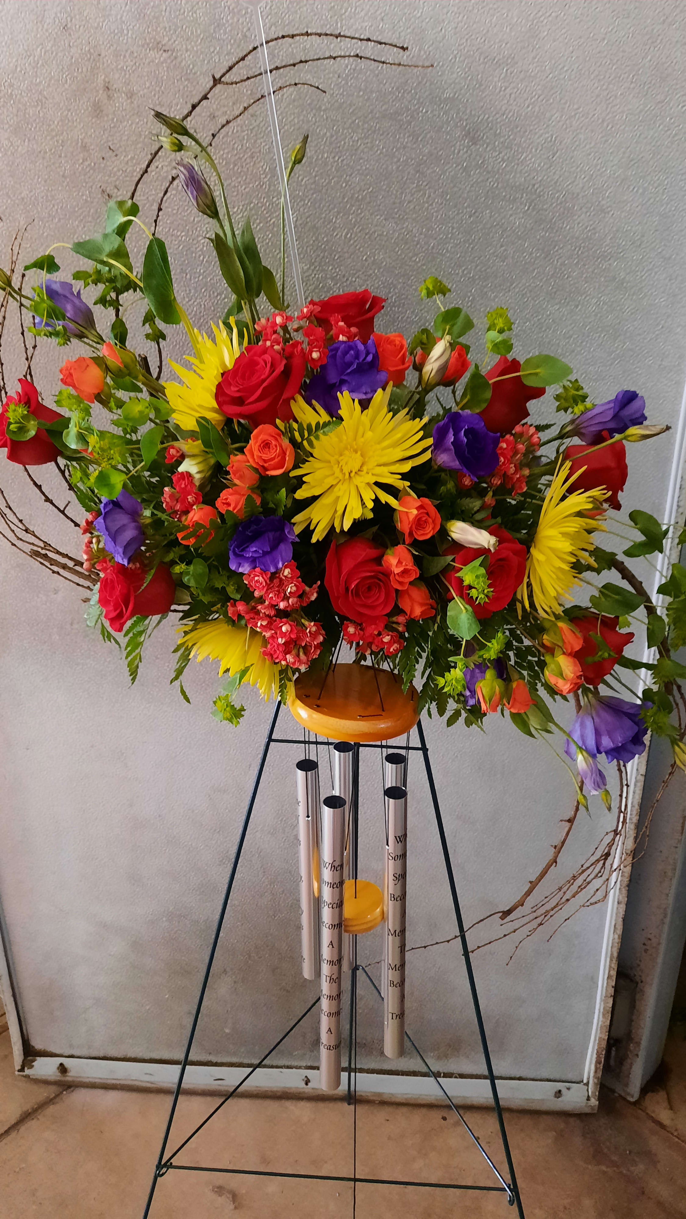 Windchime and fresh Windchime and fresh - Mixed fresh flowers atop a keepsake windchime on easel