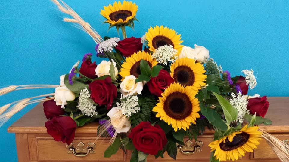 Fall Casket Spray Fall Casket Spray - A beautiful mix of fall flowers for a send off of a loved one