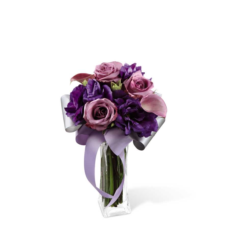 The FTD Shades of Purple Bouquet The FTD Shades of Purple Bouquet - The FTD Shades of Purple Bouquet, boasting roses and mini calla lilies, is a wonderful way to create a fantastic display of friendship and affection. Lavender roses and mini calla lilies are brought together with the deep purple of double lisianthus and beautifully arranged in a clear glass flared square vase. Accented with a lavender grosgrain ribbon, this bouquet is an ideal way to say âThank youâ or to shower them with love. GOOD bouquet includes 9 stems. Approx. 11âH x 7âH. BETTER bouquet includes 13 stems. Approx. 12âH x 8âW. BEST bouquet includes 17 stems. Approx. 13âH x 9âW.