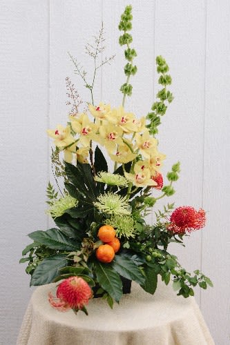Exotic surprise Exotic surprise - Cymbidium, leucadendron, spyder mums, bells of ireland