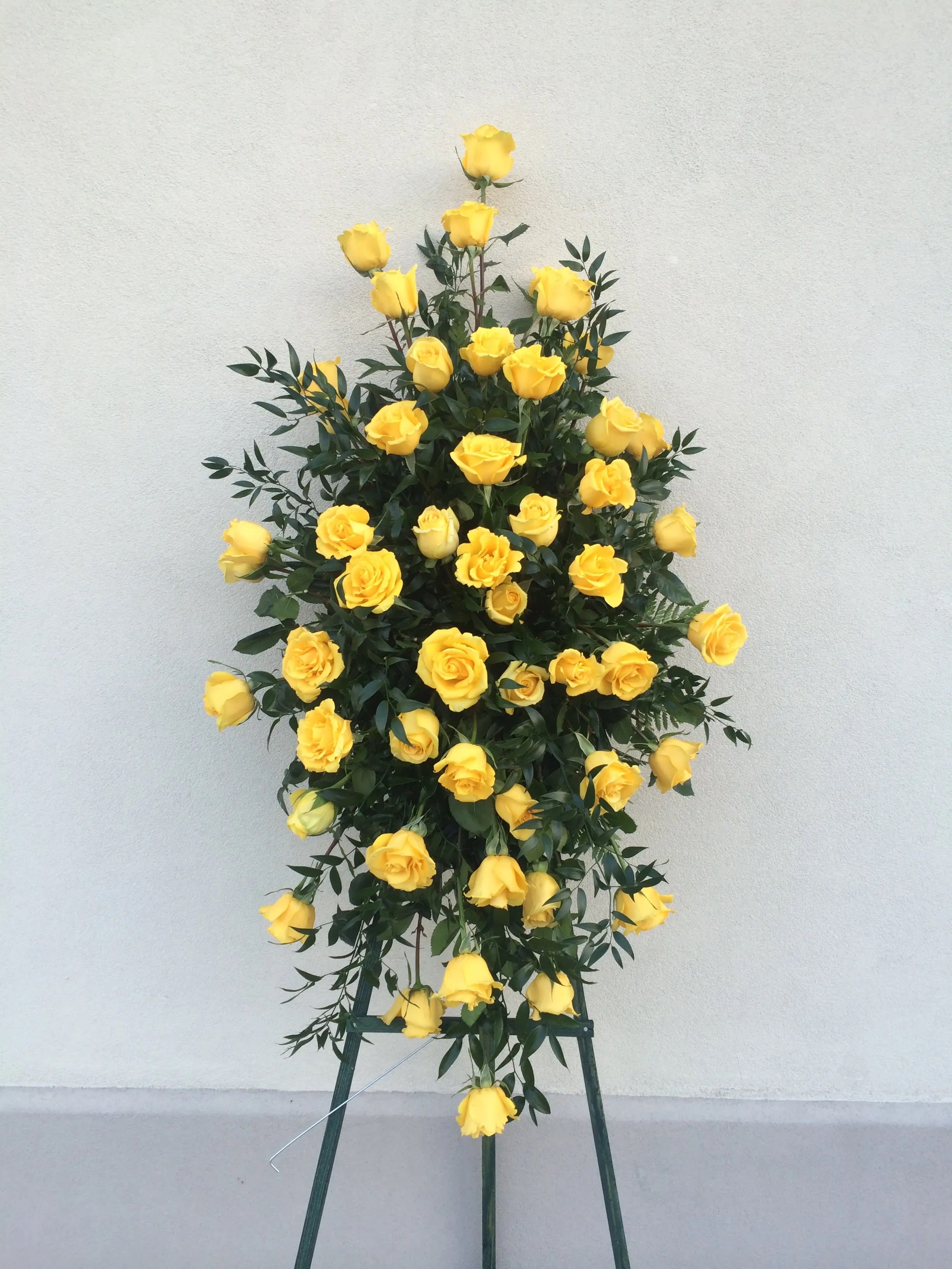Yellow Rose Standing Spray - A beautiful standing floral spray of yellow roses.