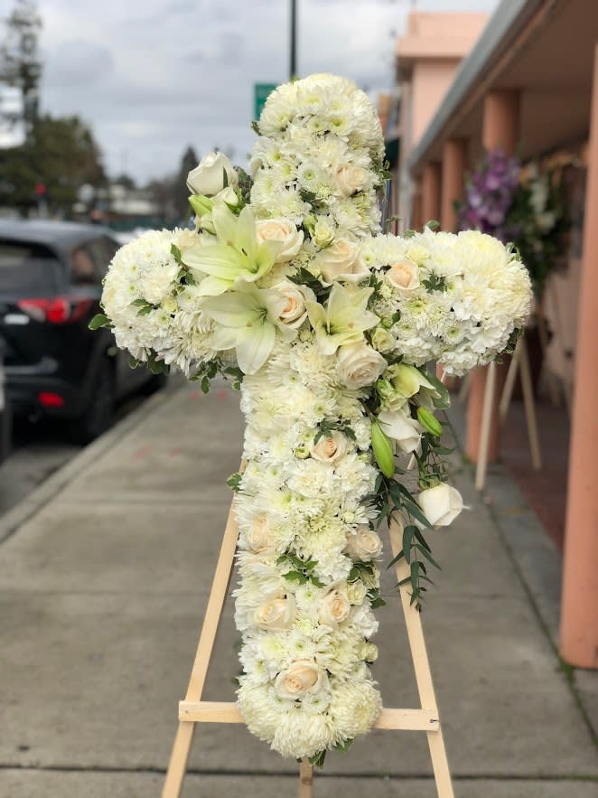 White Cross - All white cross, includes roses, carnations, chrysanthemums &amp; lilies. 