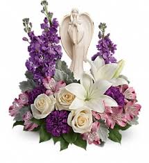 Beautiful Heart Bouquet - Peaceful and majestic, a graceful ceramic keepsake angel rests among fragrant snow white roses and white accent blossoms  -  a touching tribute to a bright life.