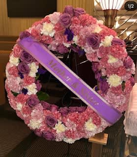 Roses and Carnation Round Wreath - 20inch round wreath filled with roses and carnations colors of choice 