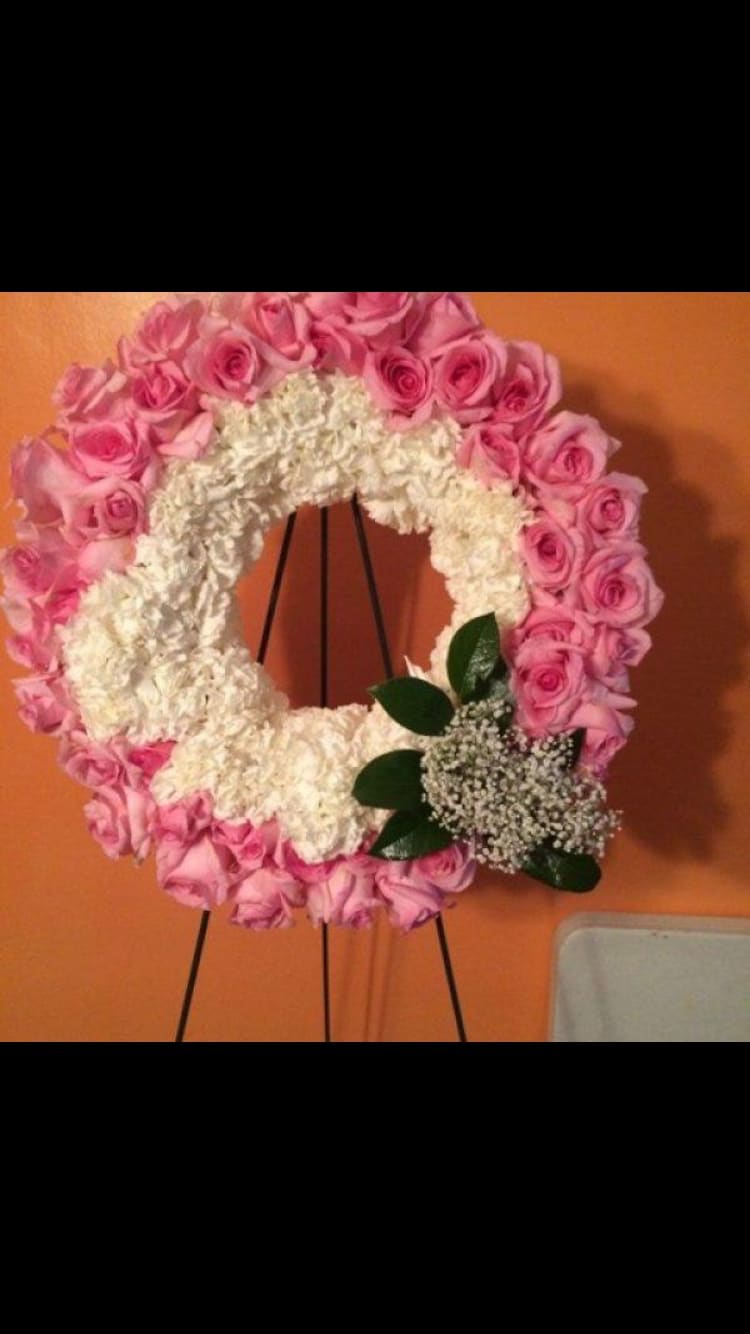 Rose and Carnations round wreath  - 20inch round wreath filled with roses and carnations 