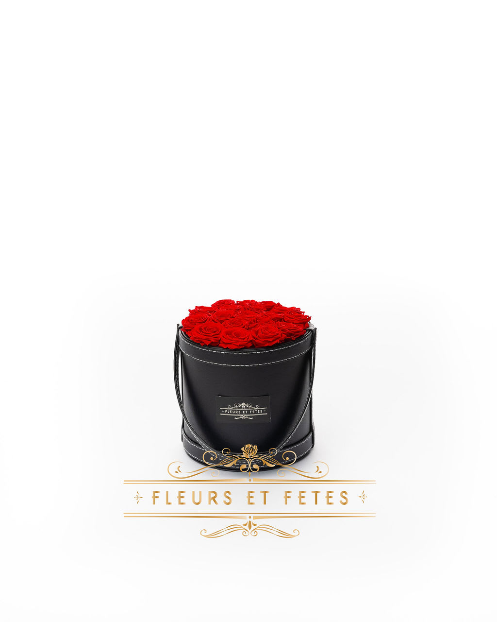 Small vegan leather box with Red Roses - This timeless arrangement is a part of our Eternity Collection and features real flowers that last up to one year. Set in our hand-stitched vegan leather round box.    **Please note that variations will occur since all of our arrangements are handmade by our in-house designers.**    Caring for Preserved Roses:  1. Do not water the arrangement 2. Keep the arrangement indoors 3. Keep the arrangement out of direct sunlight 4. Keep the arrangement in a cool, dry place 5. Do not crush, press, or fold the petals.