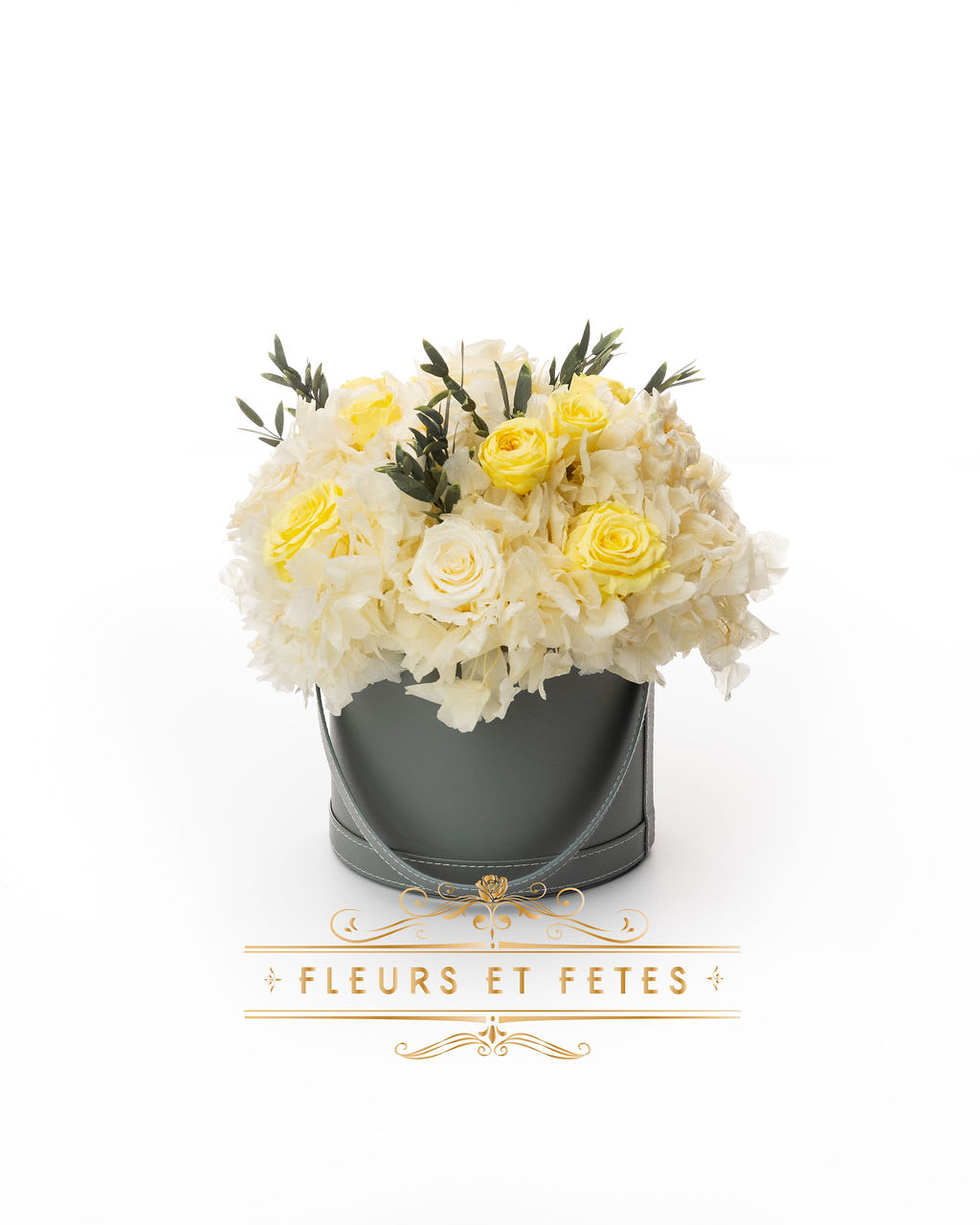 Medium vegan leather box with mixed garden flowers option 2 - This timeless arrangement is a part of our Everlasting Collection and features real flowers that last up to three years. Set in our hand-stitched vegan leather round box.   Our freshly picked Everlasting flowers have been chosen by expert farmers, and have gone through a technological process that enables them to become preserved. These flowers look and feel precisely like freshly cut flowers, but can last up to 3 years in the right conditions! Once our talented florists receive these flowers, they are arranged and designed inside a beautiful hand-stitched box. Everlasting flowers are the perfect choice for you to decorate your home or pamper your loved ones on special occasions.   Caring for Everlasting flowers:  1. Do not water the arrangement. 2. Keep the arrangement indoors. 3. Keep the arrangement out of direct sunlight. 4. Keep the arrangement in a cool, dry place. 5. Do not crush, press, or fold the petals.  **Please note that variations will occur since all of our arrangements are handmade by our in-house designers.** 