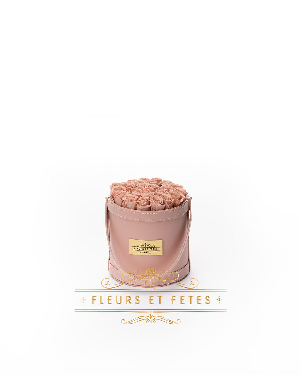 Small vegan leather box with Pink Roses - This timeless arrangement is a part of our Everlasting Collection and features real flowers that last up to three years. Set in our hand-stitched vegan leather round box.   Our freshly picked Everlasting flowers have been chosen by expert farmers, and have gone through a technological process that enables them to become preserved. These flowers look and feel precisely like freshly cut flowers, but can last up to 3 years in the right conditions! Once our talented florists receive these flowers, they are arranged and designed inside a beautiful hand-stitched box. Everlasting flowers are the perfect choice for you to decorate your home or pamper your loved ones on special occasions.   Caring for Everlasting flowers:  1. Do not water the arrangement. 2. Keep the arrangement indoors. 3. Keep the arrangement out of direct sunlight. 4. Keep the arrangement in a cool, dry place. 5. Do not crush, press, or fold the petals.  **Please note that variations will occur since all of our arrangements are handmade by our in-house designers.** 