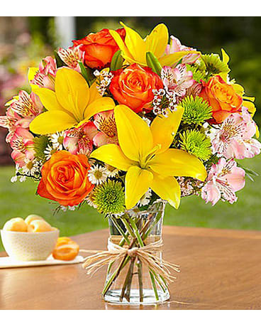 Fields Of Europe Fields Of Europe - Inspired by the spectrum of color in the rolling fields found throughout Europe, our florists designed this gathering of fresh roses, lilies, alstroemeria, poms and more inside a stylish clear glass vase tied with raffia, as a nod to rustic European style. All flowers and colors are subject to change due to availability. FCF-90977