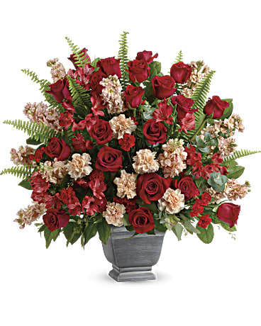 Bold Tribute Spray Bold Tribute Spray - Bold and beautiful, this majestic mix of red roses and fresh greens in a large, stone-inspired pot is a show of strength and support.
