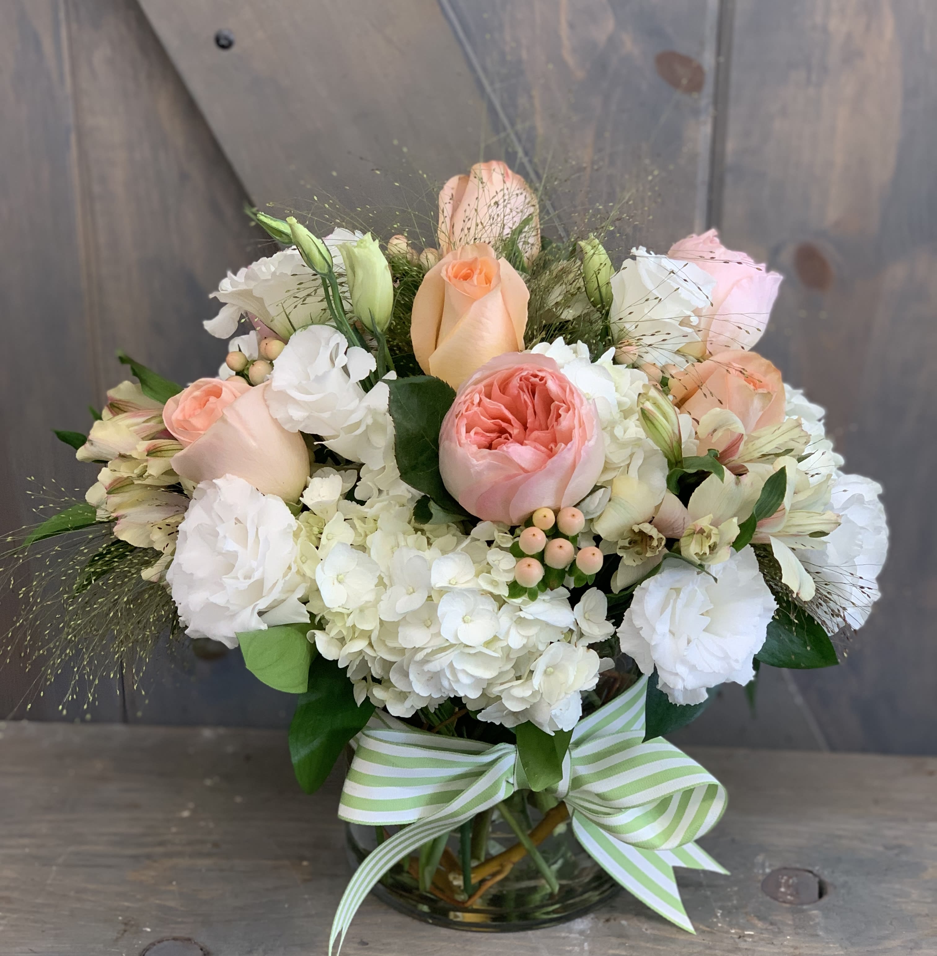 Peachy Peachy - This elegant designer includes Juliet Garden Roses, Hydrangea, Roses, Lisianthus, Alstromera, Coffee Berry, and Explosion grass