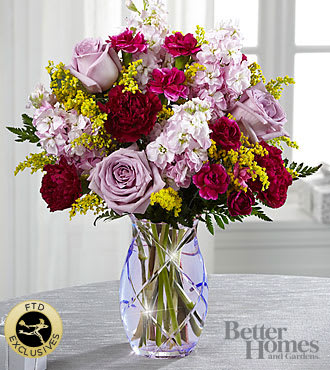 The FTD Gratitude Glimmers Bouquet by Better Homes and Gardens - Pastel roses and stock are punctuated by brilliant fuchsia carnations and sunny Goldenrod.