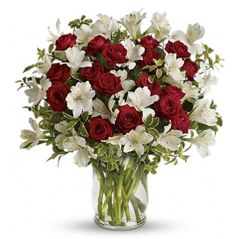  Endless Romance Bouquet - Endless roses, endless romance! Make a statement with our stunning bouquet of red roses with snowy white blossoms, delivered in a glass hurricane vase that will forever remind her of your love.  Includes red spray roses, white alstroemeria and pretty pitta negra. Delivered in a glass hurricane vase.      Orientation: One-Sided      All prices in USD ($)      Standard      TEV23-3A      Deluxe      TEV23-3B      Premium      TEV23-3C 