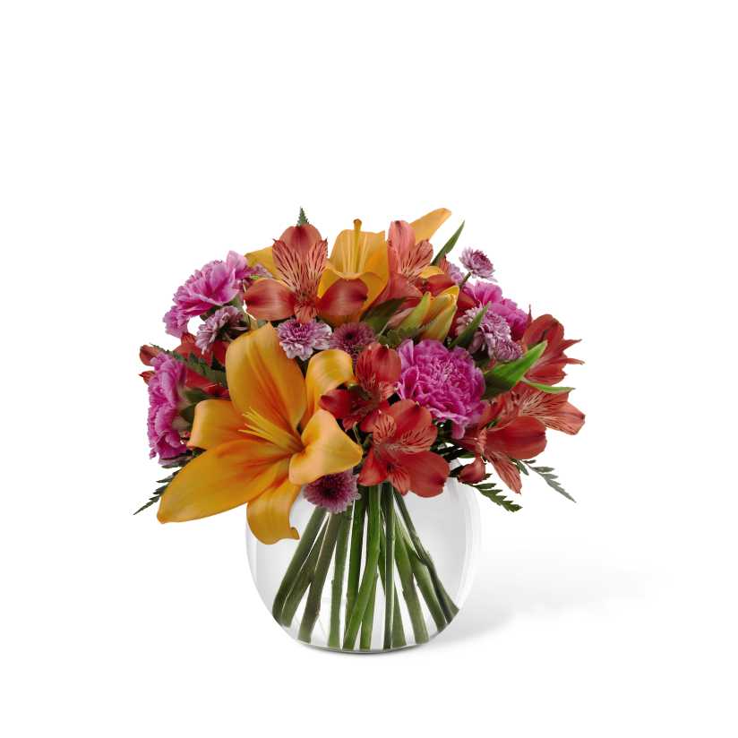 The FTD Light of My Life Bouquet - The FTD Light of My Life Bouquet offers your special recipient fresh vibrant color to brighten their day! Orange Asiatic lilies, fuchsia carnations, red Peruvian lilies, lavender chrysanthemums and lush greens are perfectly arranged in a clear glass bubble bowl vase to send your sweetest sentiments across the miles. GOOD bouquet includes 11 stems. Approx. 10âH x 10âW. BETTER bouquet includes 15 stems. Approx. 13âH x 13âW. BEST bouquet includes 19 stems. Approx. 14âH x 14âW.