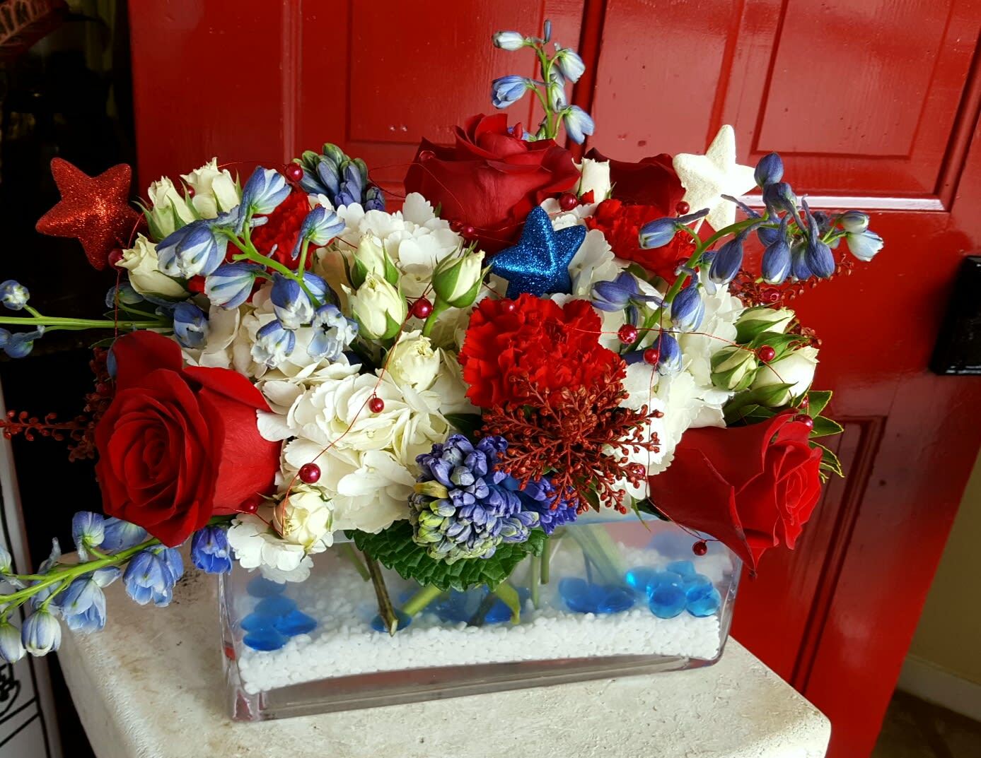 ALL AMERICAN LOVER - THIS BEAUTIFUL DISPLAY OF RED, WHITE AND BLUE FLOWERS IS A TRIBUTE TO, THE LOVE FOR OUR COUNTRY.