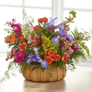The FTD® Garden of Life Basket The FTD® Garden of Life Basket - "A gorgeous mix of beautiful, bright summer flowers offers an uplifting expression of your sympathy and love. This basket comes designed with iris, stock and roses from a local florist to share your thoughtful sentiments to any service or home. - Details: o Good bouquet is approximately 16""H x 23""W o Better bouquet is approximately 17""H x 24""W o Best bouquet is approximately 20""H x 25""W "