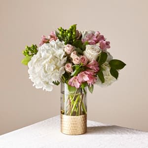 The FTD® Rosé All Day Bouquet The FTD® Rosé All Day Bouquet - Give the gift of freshness with a vase full of Rosé All Day. This blush beauty brings elegant excitement to end tables and entryways alike with its selection of roses, hydrangea, spray roses, and more.