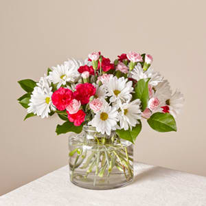 The FTD® Sweet Surprises® Bouquet The FTD® Sweet Surprises® Bouquet - The sweetest bouquet around. Whether you’re sending a surprise or treating yourself to these pretty in pink blooms, this bouquet makes for an unforgettable gift. Details: - Good bouquet is about 14""H x 12""W - Better bouquet is about 15""H x 13""W - Best bouquet is a about 17""H x 15""W