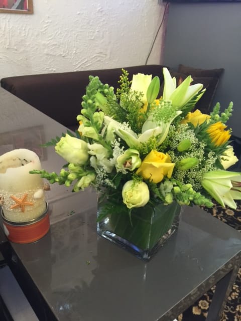 SUNSHINE BOUQUET- ON SALE WAS $69 SUNSHINE BOUQUET- ON SALE WAS $69 - MAKE THEIR DAY WITH THIS CHEERFUL ARRAY OF YELLOWS AND WHITE BLOOMS, SUCH AS LILIES, ROSES, SUNFLOWERS AND SNAPS.