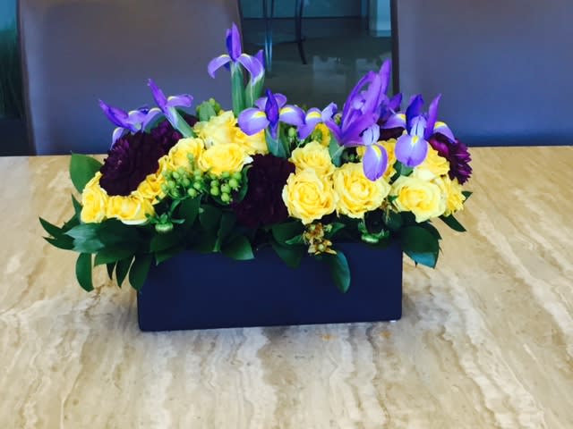 TREASURED BLOOMING GARDEN - A BEAUTIFUL DISPLAY OF  YELLOW ROSES, IRIS AND MORE. CONTAINER MAY VARY...