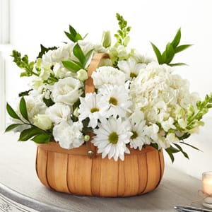 The FTD® Pure Ivory™ Basket - With our Pure Ivory™ Basket, share comfort and solace to your loved ones who are going through a time of loss. Our local florists handcraft this basket of hydrangea, daisy pompons and snapdragons to share your messages of sympathy. - Detail: o Good bouquet is approximately 14&quot;H x 17&quot;W o Better bouquet is approximately 17&quot;H x 19&quot;W o Best bouquet is approximately 19&quot;H x 23&quot;W