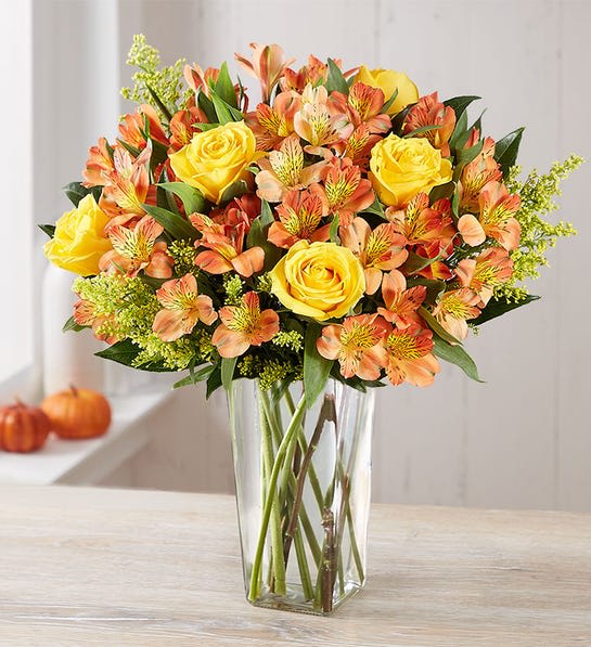 Fall Rose &amp; Peruvian Lily Bouquet - Our fresh fall bouquet is brimming with beauty and color. Vibrant, long-stem yellow roses pair with rich orange Peruvian lilies to make every birthday, anniversary, housewarming, or homecoming a little brighter.