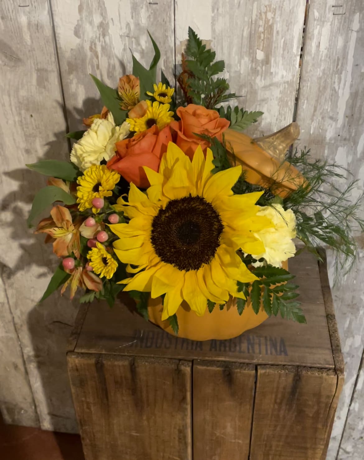Sunny Pumpkin Sunny Pumpkin - This adorable arrangement comes in a keepsake pumpkin container that can be reused as a candy dish, fall decoration or even cookie jar! Upgrade to deluxe or premium to include even more sunflowers and/or roses.