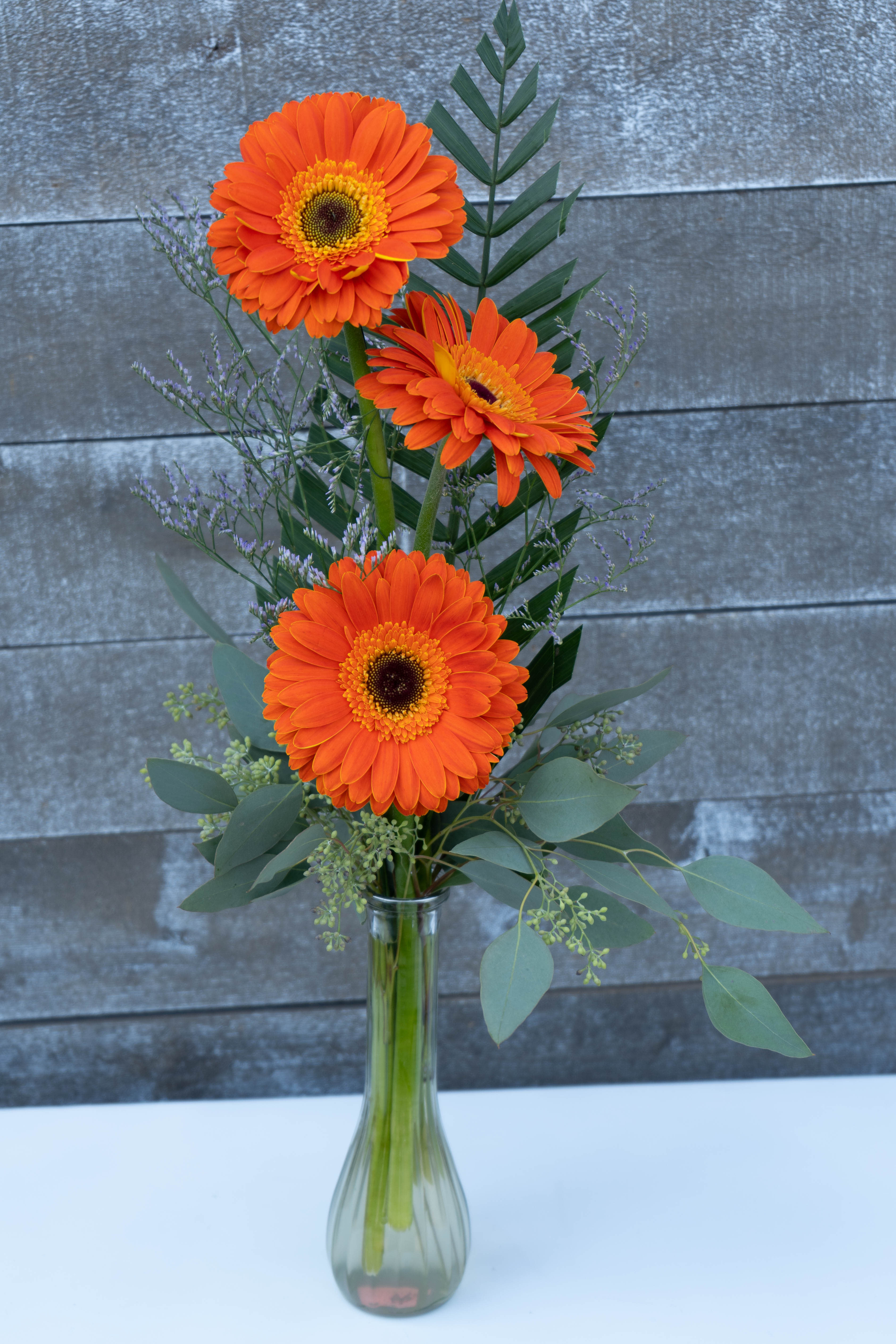 3 orange gerbera daisy bud vase in Los Angeles, CA | Century City Flower  Market