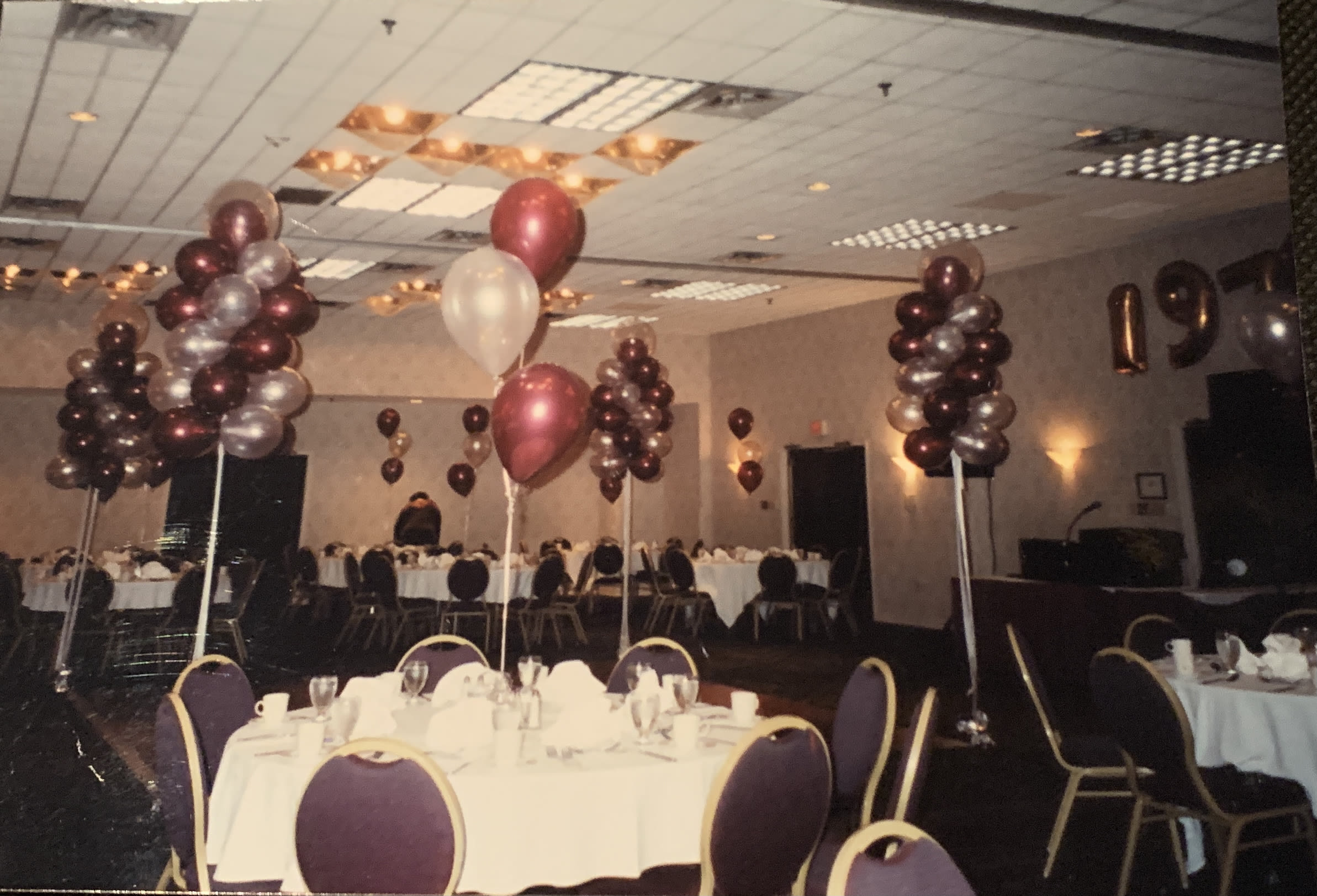 Floating Balloon Columns and Balloon Centerpieces(Prices Vary) Floating Balloon Columns and Balloon Centerpieces(Prices Vary) - Choose your color scheme or theme for this look. Centerpieces can be foil weighted or enhanced with candy, your theme, etc. You can have as many balloons on the weight as desired. Prices will vary below price is starting price for balloon centerpiece on sand weight.