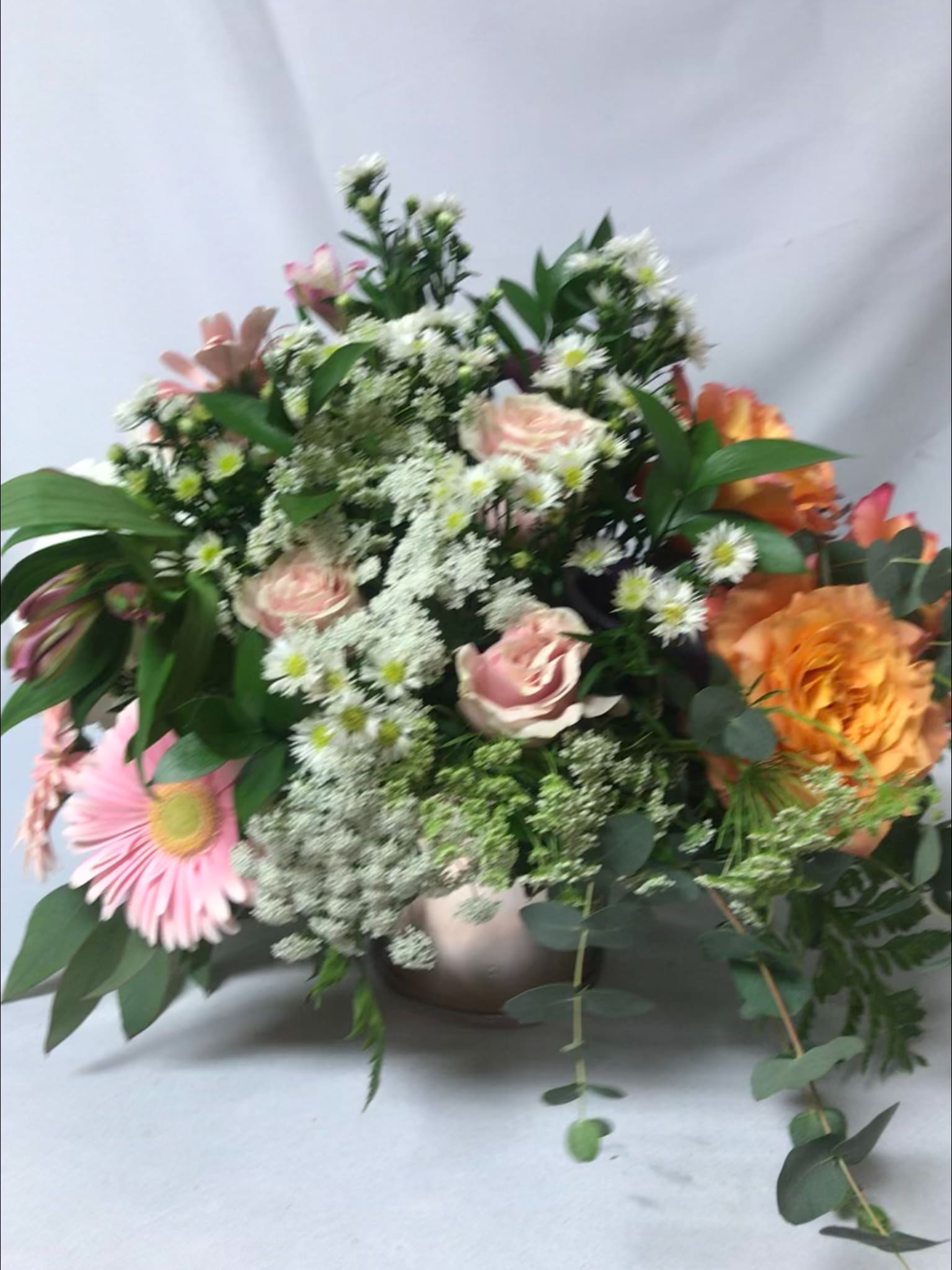 Hiding in Plain Sight - Among the playful daisies the pinks and pastel oranges play peek-a-boo with the greenery and whites.