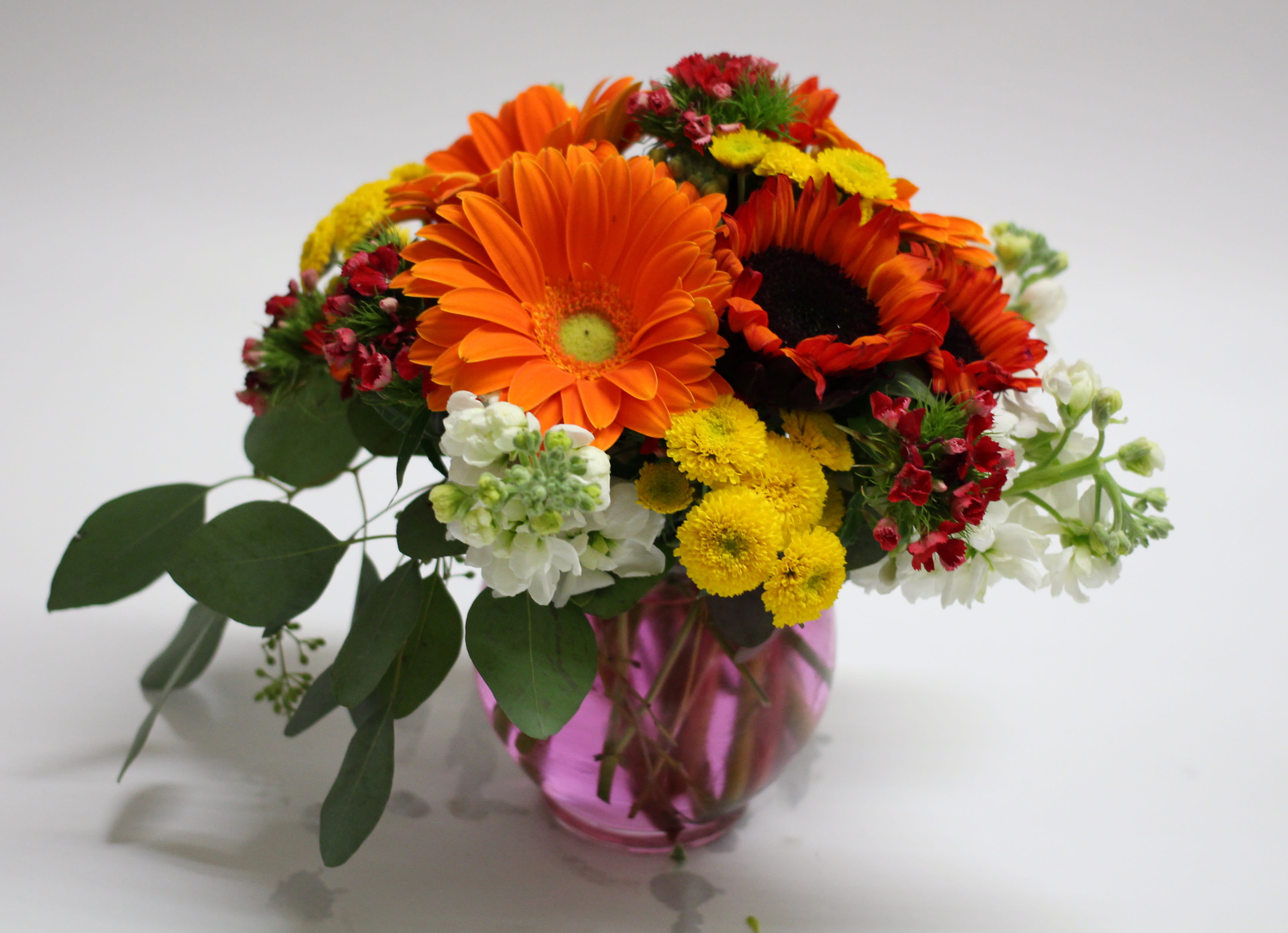 Colorful Mix Colorful Mix - Gerber Daisies, Sunflowers w/ yellow button.