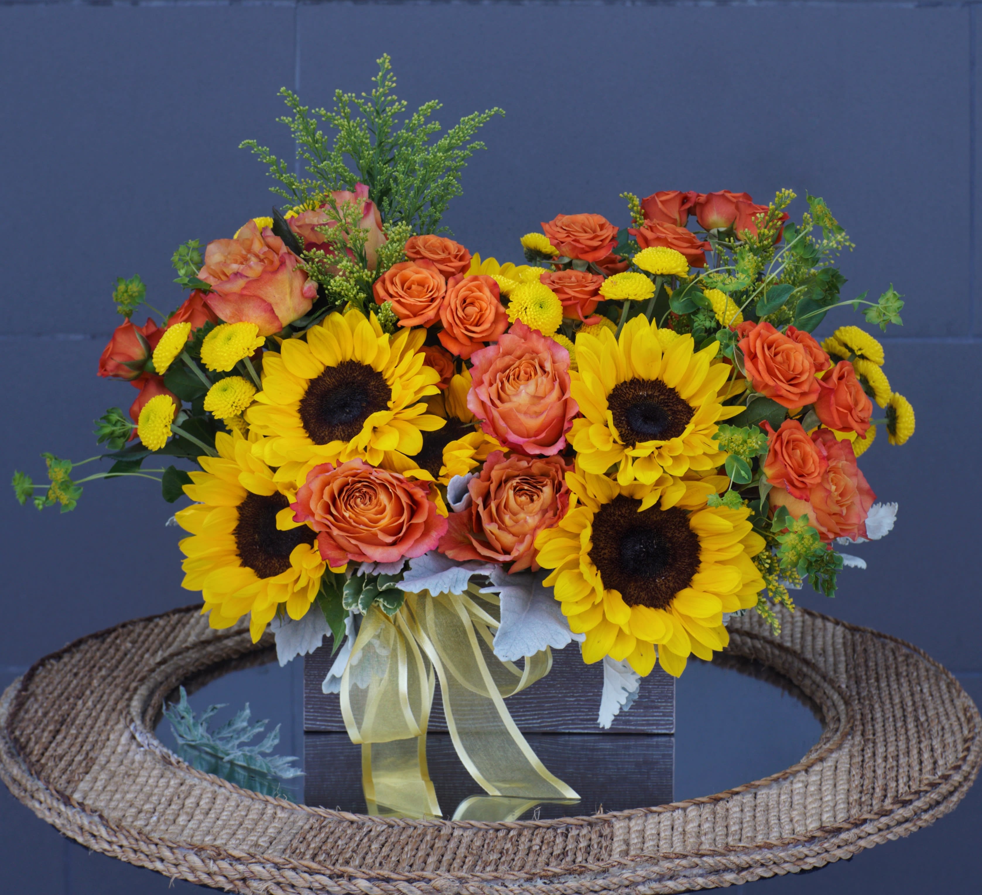 Box of Sunshine - Wood box full of fresh flowers: sunflower, rose, pompon... and nice accents. STANDARD: FIRST PHOTO DELUXE: SECOND PHOTO