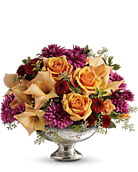 Elegant tradition centerpiece - premium container with seasonal flowers