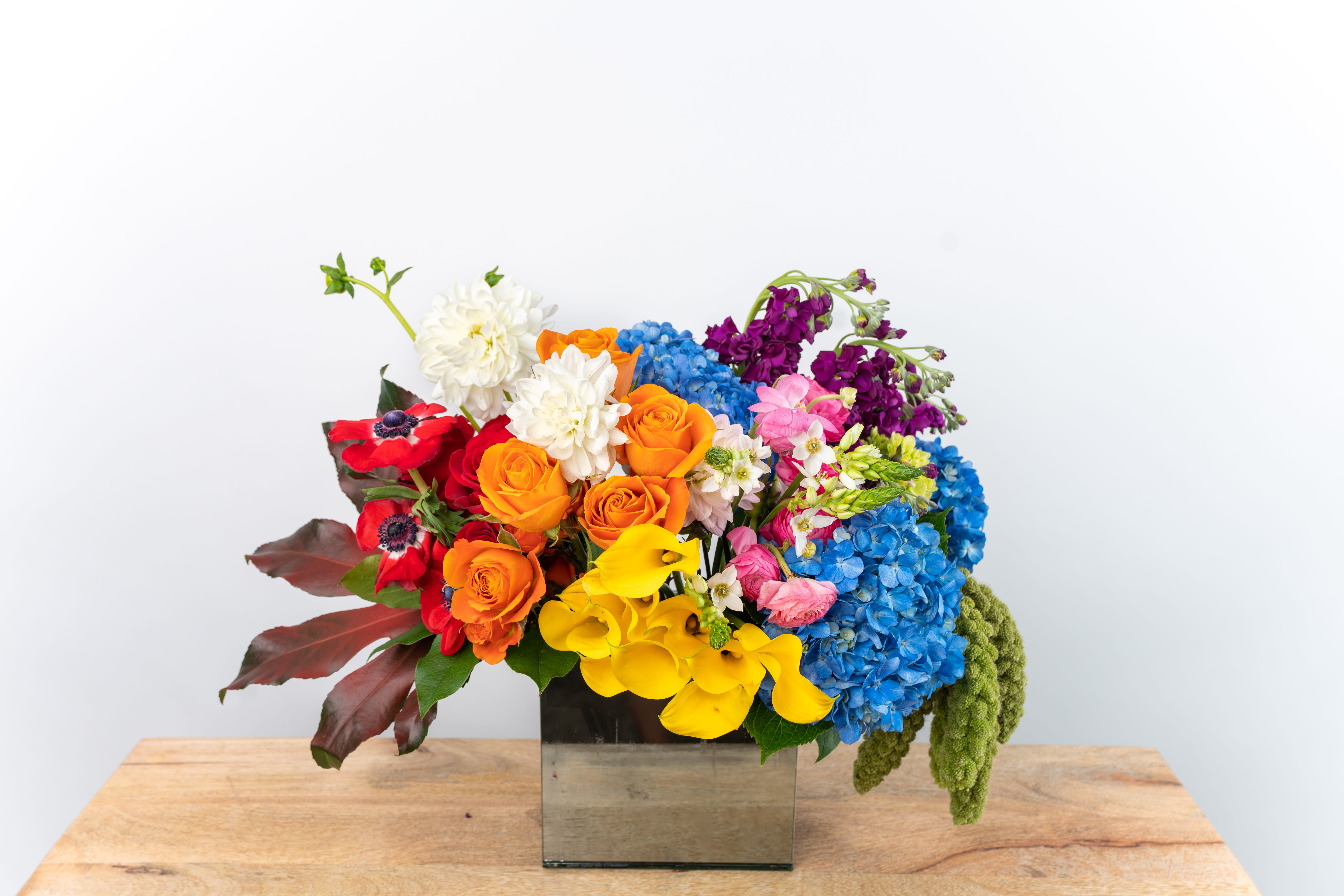 The Prism The Prism - Show your pride -- and celebrate with a rainbow of gorgeous hues. The Prism reflects joy, light, passion, and purer fun with its palette of rich colors with fresh greens. They all vie for the spotlight, creating a spectrum of eye.