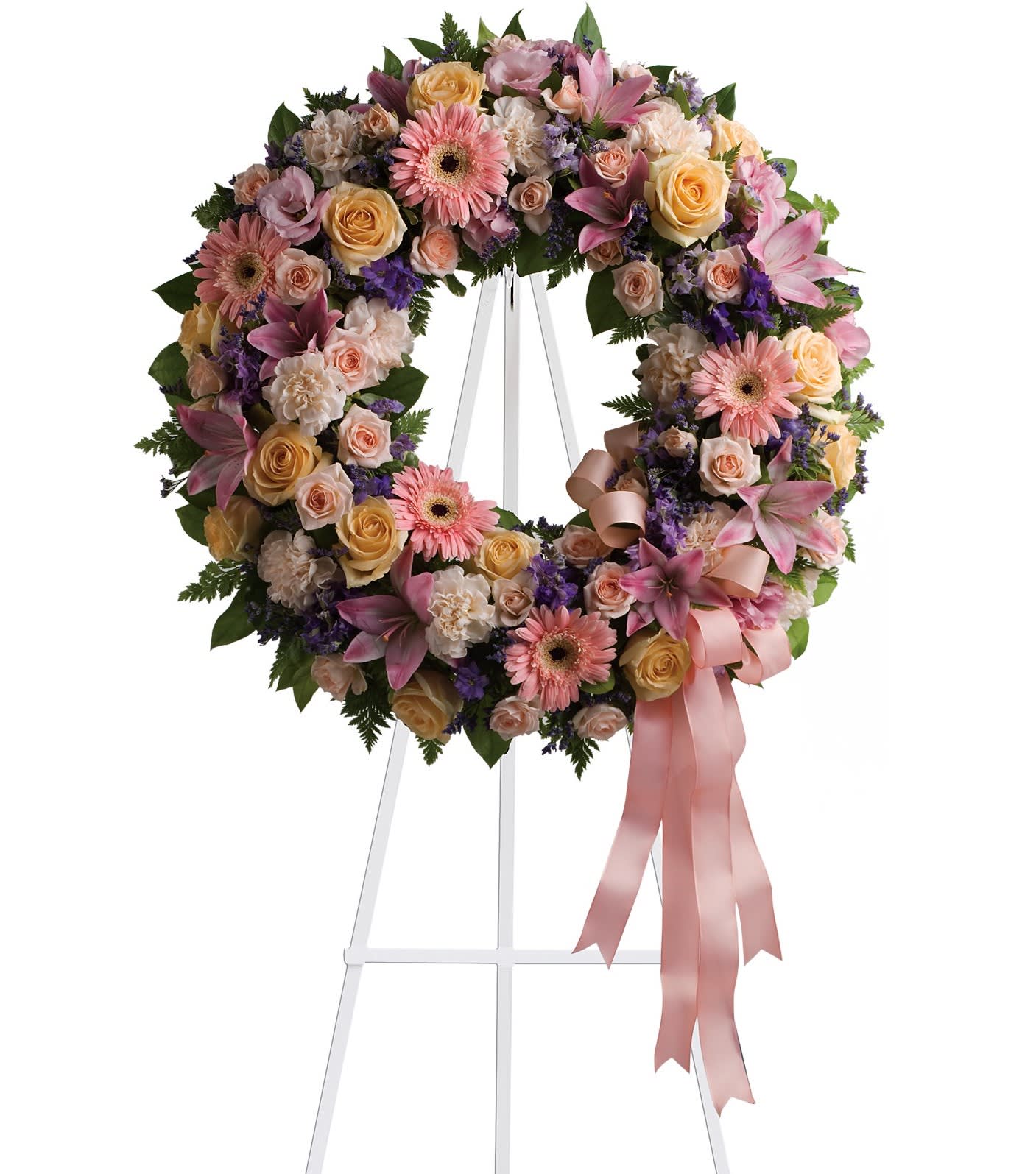 Graceful Wreath - Family and friends will recollect how special their loved one was with this gentle and timeless circle of fragrant blooms to celebrate sweet memories. 