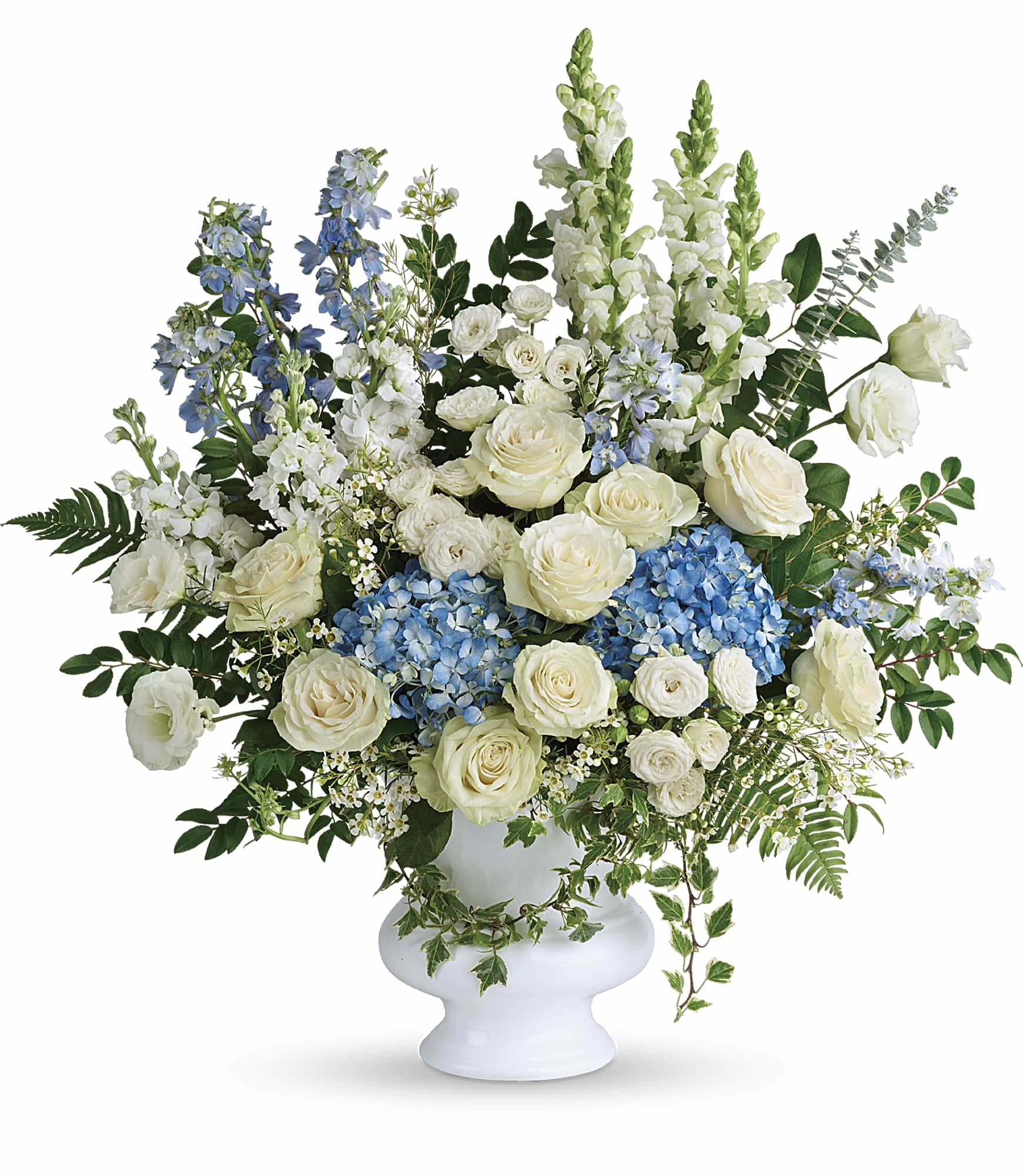 Treasured And Beloved Bouquet - A treasured tribute to your beloved, this gorgeously grand bouquet of soft blue hydrangea and pure white roses is reminiscent of a clear sky, a hopeful reminder of life and love. 