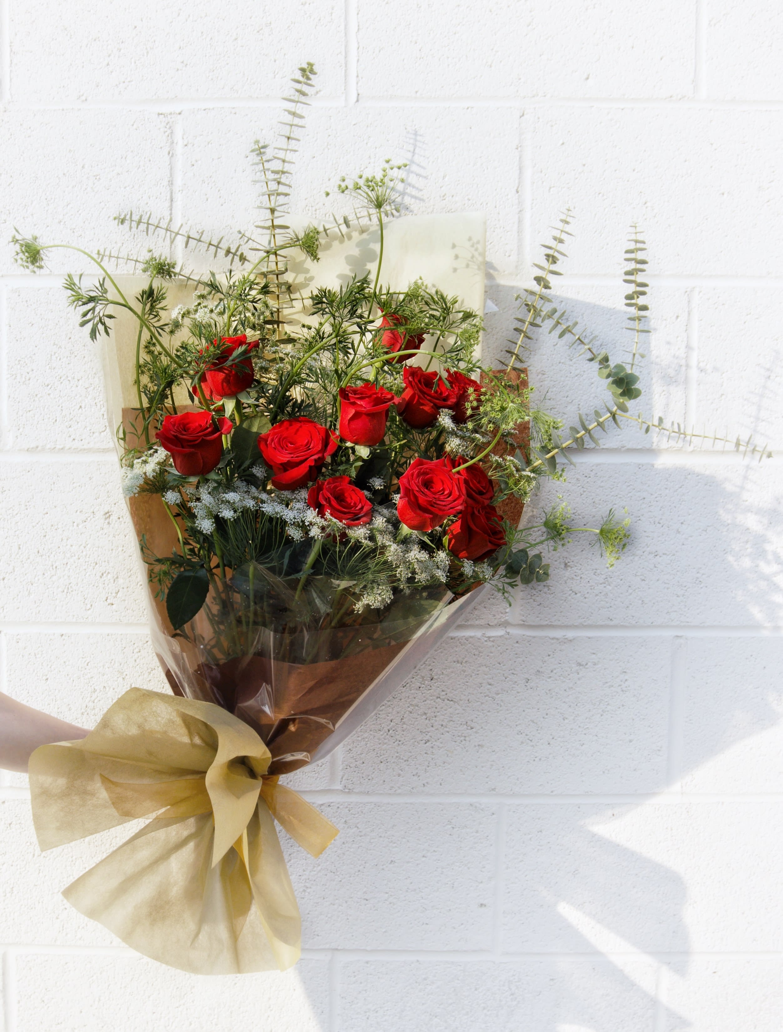 Rose Wrapped - Premium Ecuadorian roses and accents beautifully wrapped. GLASS VASE INCLUDED. CUSTOMER CAN CHOOSE ANY COLOR OF ROSE. STANDARD: 12 ROSES DELUXE: 24 ROSES PREMIUM: 36 ROSES