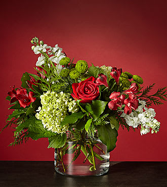 WINTER BRIGHT BOUQUET - UPGRADES GLASS VASE WITH GREEN HYDRANGEA, RED ROSES, WHITE STOCK, GREEN MUMS AND RED ALSTROMERIA