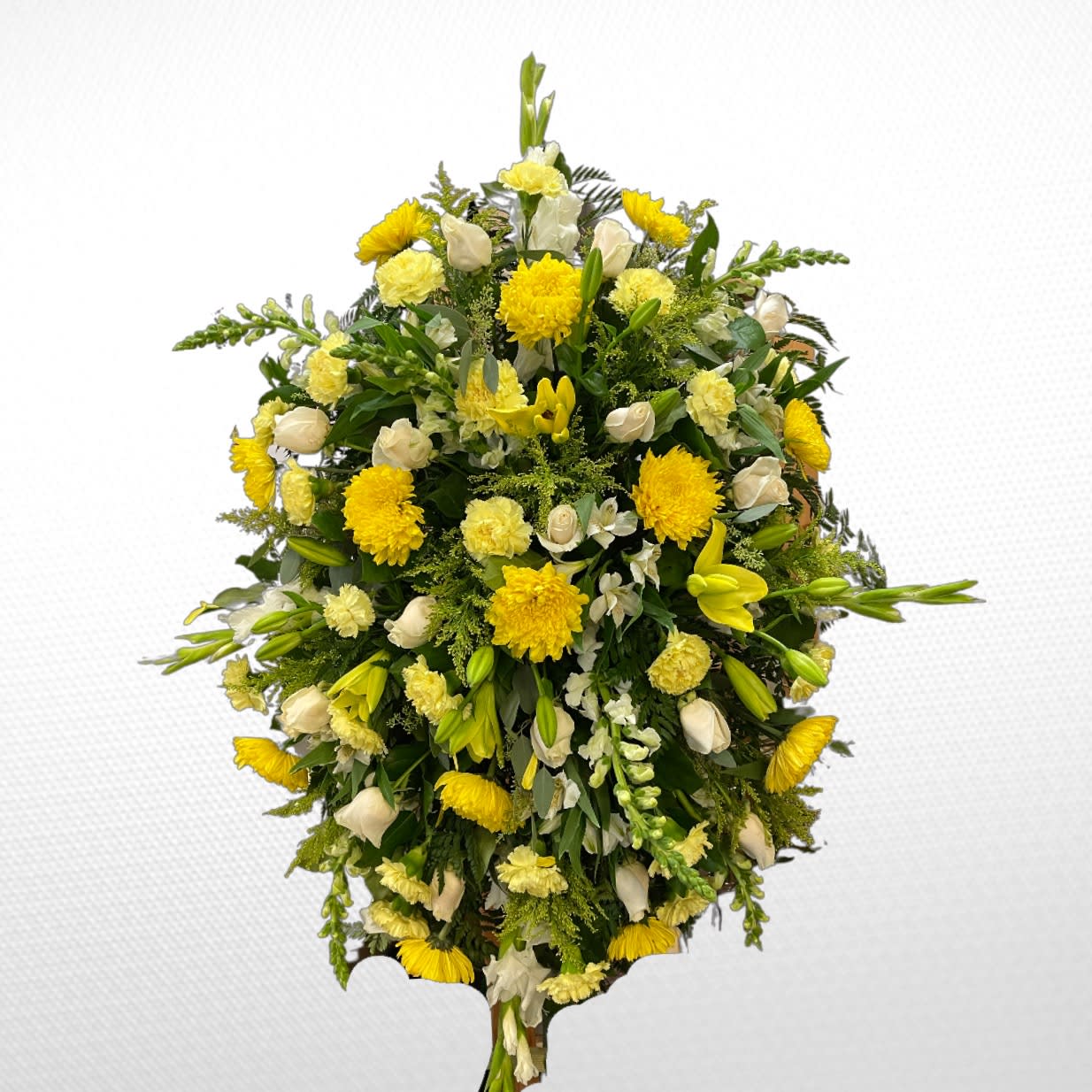 Yellow and White Standing Spray Yellow and White Standing Spray - A yellow and white standing spray on an easel consisting of disbuds, roses, lilies, carnations, alstroemeria and more.