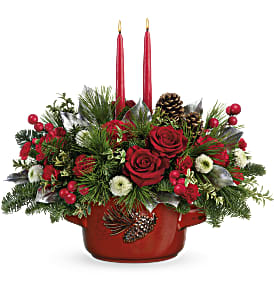 CHRISTMAS HEIRLOOM CENTERPIECE - Reminiscent of a family heirloom, this stunning stoneware serving dish is food-safe for stylish seasonal entertaining. It's the perfect presentation for an elegant Christmas rose bouquet!  Red roses, red carnations, miniature red carnations and white button spray chrysanthemums are arranged with noble fit, white pine, oregonia and lemon leaf. Delivered in Teleflora's Vintage Stoneware Bowl. Approximately 18&quot; W x 15&quot; H