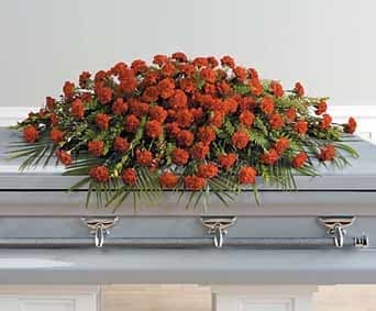 Red Monochromatic Casket Spray - Large casket spray of all red roses and carnations. Complimented with assorted foliage.