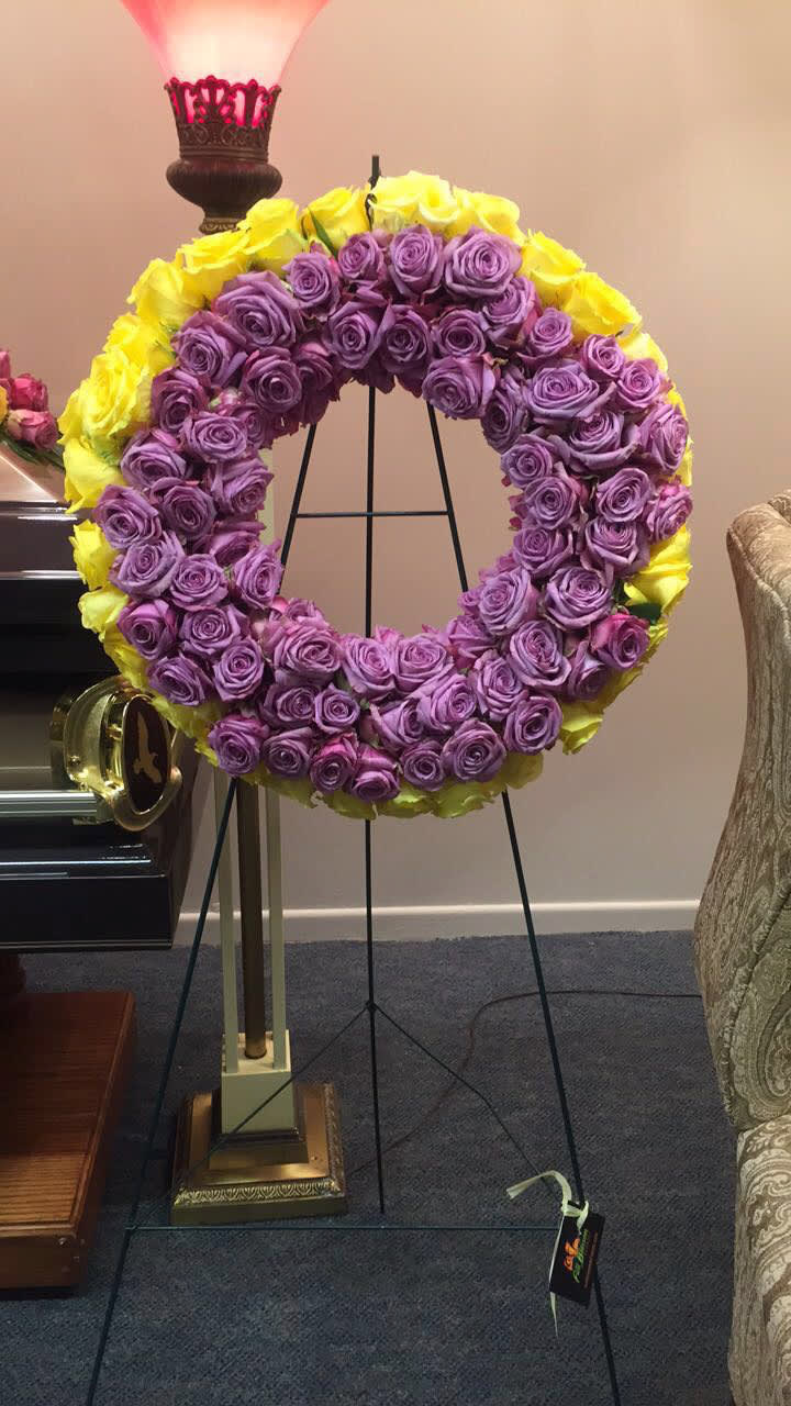 All roses multi colored round wreath  - 20inch round wreath filled with roses, colors of choice